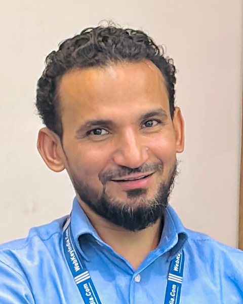 Asif Ali, founder of WebKey India, wearing a WebKey India lanyard